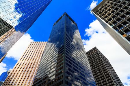 Skyward view of modern downtown skyscrapers.
