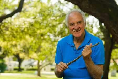 Elderly handsome man outdoor portrait.の写真素材
