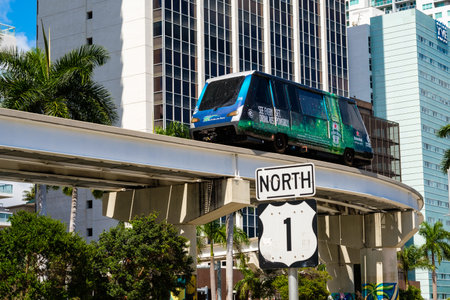 Miami, FL USA - March 1, 2017: Downtown Miami cityscape with the popular Metromover passing along Biscayne Boulevard.のeditorial素材