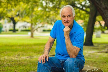 Elderly handsome man outdoor portrait.の写真素材