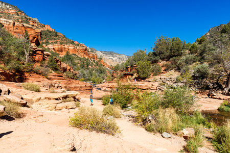 Coconino, AZ USA - October 17, 2016: Visitors enjoying the beauty of Slide Rock State Park with its natural rock water slides in the Oak Creek Canyon near Sedona.のeditorial素材