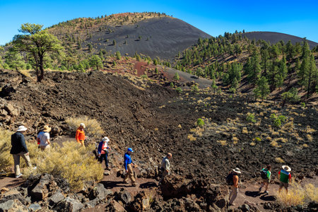 Flagstaff, AZ USA - October 15, 2016: Visitors enjoying the natural beauty of the crystallized lava flow at the Sunset Crater Volcano.のeditorial素材