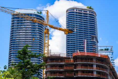 Miami, Florida - August 8, 2017: The Flatiron construction project underway in the popular Brickell area in downtown Miami.のeditorial素材