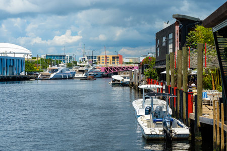 Miami, Florida - August 16, 2017: Scenic Miami River cityscape with marinas and boatyards along the Northwest Fifth Street drawbridge.のeditorial素材