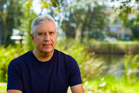 Handsome middle age man outdoor portrait.の写真素材