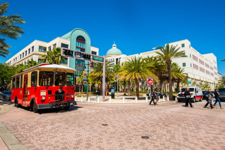 West Palm Beach, Florida - March 14, 2018: Cityscape view of the the popular West Palm Beach downtown district with City Hall along Clematis Street.のeditorial素材