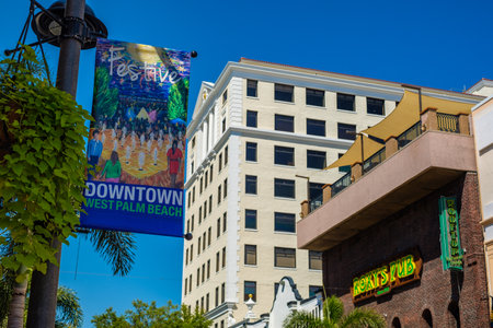 West Palm Beach, Florida - March 14, 2018: Cityscape view of the the popular West Palm Beach downtown district with restaurants and retail stores along Clematis Street.のeditorial素材