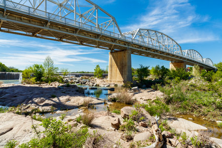 The rustic Highway 71 bridge over the Llano River in the small Texas Hill Country town of LLano.のeditorial素材