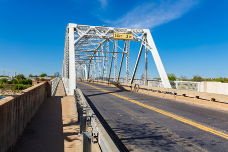 The rustic Highway 71 bridge over the Llano River in the small Texas Hill Country town of LLano.のeditorial素材