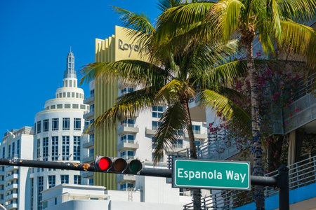Miami Beach, Florida USA - March 4, 2019: Cityscape view of the classic art deco hotel architecture with palm trees along popular Collins Avenue.のeditorial素材