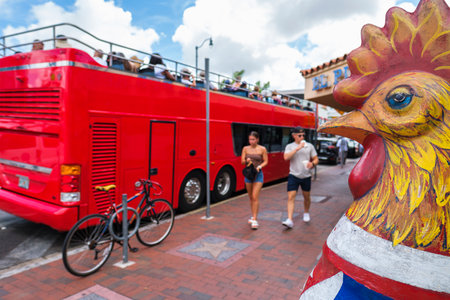 Miami, Florida USA - July 22, 2019: Tourists enjoying the popular Calle Ocho in historic Little Havana with retail shops and restaurants.のeditorial素材