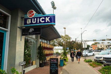 Fredericksburg, Texas USA - October 28, 2019: Cityscape storefront of the increasingly popular vineyards in this tourist friendly Hill Country town.のeditorial素材
