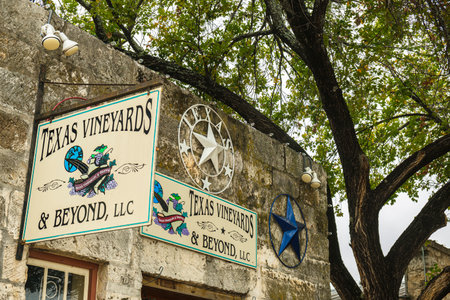 Fredericksburg, Texas USA - October 28, 2019: Cityscape storefront of the increasingly popular vineyards in this tourist friendly Hill Country town.のeditorial素材