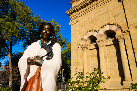 Santa Fe, New Mexico USA - October 22, 2019: The statue of Kateri Tekakwitha, the first North American indian to be promoted to a saint, outside the Cathedral Basilica of St. Francis of Assisi.のeditorial素材