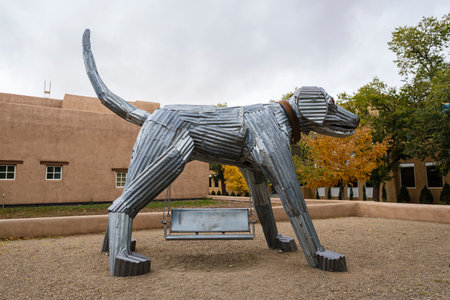 Santa Fe, New Mexico USA - October 24, 2019: Barn dog steel sculpture, by artist Don Kennell, on display at the convention center.のeditorial素材
