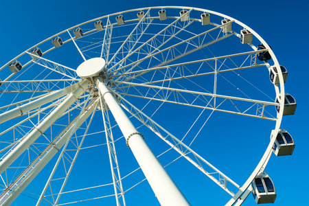 Panama City, Florida USA - September 29, 2019:  The new Skywheel ferris wheel, opened in 2018, located in the popular Pier Park across the beach.のeditorial素材