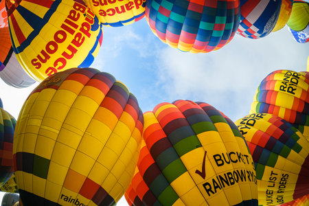Albuquerque, New Mexico USA - October 5, 2019: Colorful hot air balloons preparing for flight at the famous annual Albuquerque Hot Air Balloon Fiesta located in the dedicated Balloon Fiesta Park.のeditorial素材