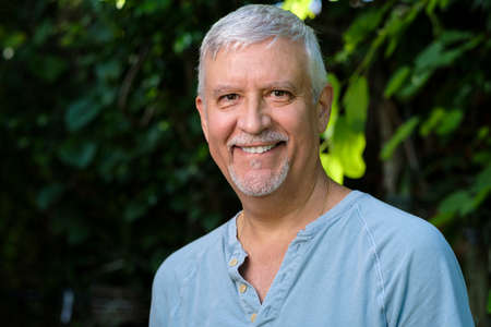 Handsome middle age man outdoor portrait.