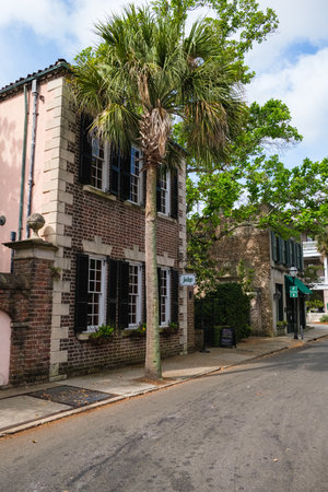 Charleston, South Carolina USA - May 3, 2022: Vintage retail commercial buildings located in the historic downtown district on Queen Street.のeditorial素材