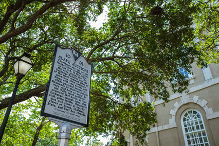 Charleston, South Carolina USA - May 3, 2022: Sign documenting the 1770s and later slave auctions conducted in the Exchange Building in the historic downtown district.のeditorial素材