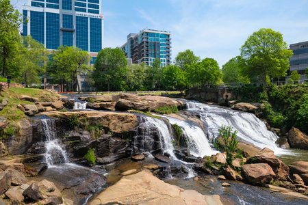 Greenville, South Carolina USA - May 4, 2022: Downtown cityscape view of the popular Falls Park on the Reedy in this charming southern town.のeditorial素材