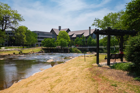 Greenville, South Carolina USA - May 4, 2022: Downtown cityscape view of Falls Park on the Reedy in this charming southern town.のeditorial素材