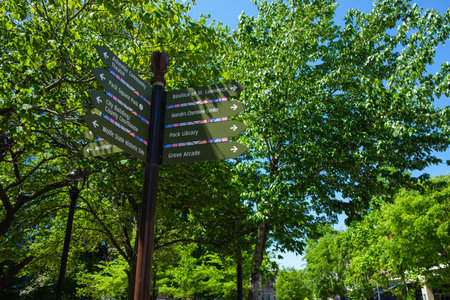 Asheville, North Carolina USA - May 5, 2022: Cityscape view of the directional signs in the downtown...