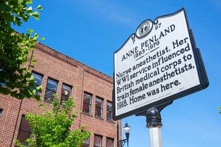 Asheville, North Carolina USA - May 5, 2022: Sign commemorating Anne Penland in the downtown urban...