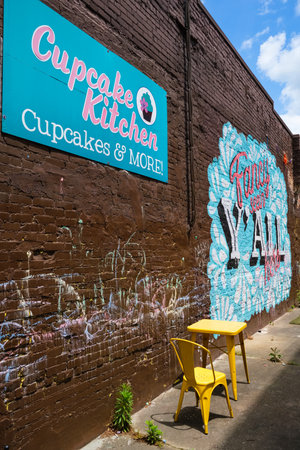 Chattanooga, Tennessee USA - May 13, 2022: Vintage red brick building with retail sign advertisement in the downtown districtのeditorial素材
