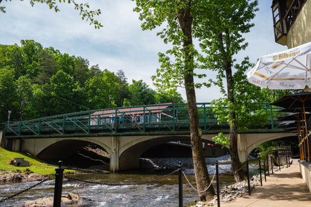 Helen, Georgia USA - May 16, 2022: Cityscape view of the bridge over the Chattahoochee River in this small mountain town in the northeast region of the stateのeditorial素材