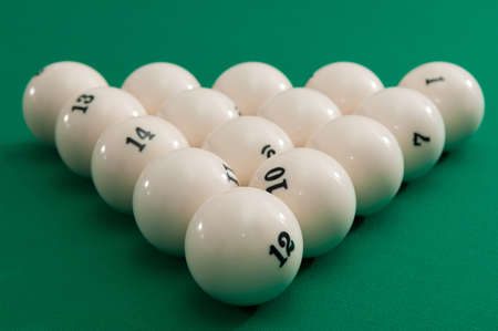ivory balls are placed in a triangle