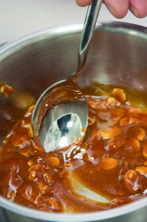 cook prevents dish with the melted caramel, cooking food in a restaurantの写真素材