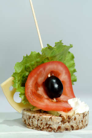 dish with a share of tomatoes, parsley, olives and meatの写真素材