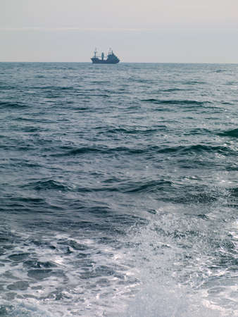 passenger ship on the horizon and clear skyの写真素材