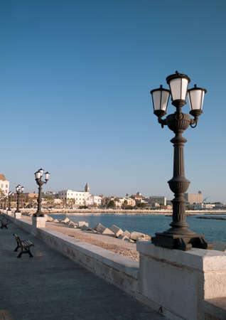 embankment in Italy with a street lamp in the foregroundの写真素材