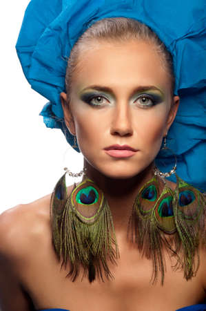 woman in a blue dress on the isolated backgroundの写真素材