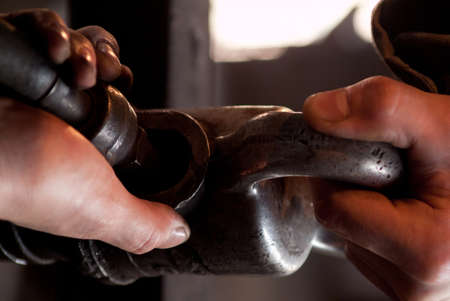 the hands of a businessman carrying a briefcaseの写真素材