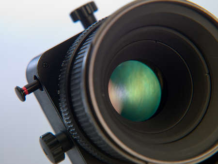 Professional camera lens close-up on a white backgroundの写真素材