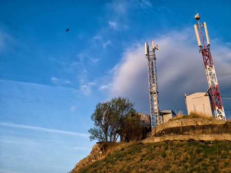 Measuring devices are in the mountains with beautiful cloudsの写真素材
