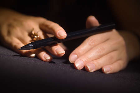 hands of the people photographed in different ways in the studioの写真素材