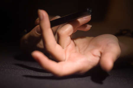 hands of the people photographed in different ways in the studioの写真素材