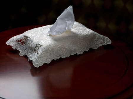 paper and cloth on a wooden table
