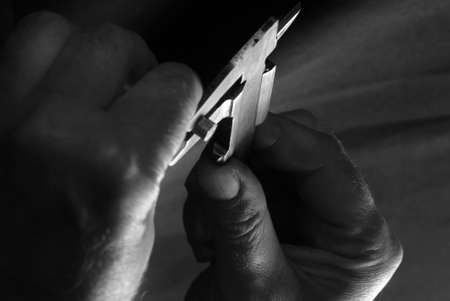 photo hands of the men working at the momentの写真素材