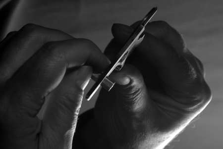 photo hands of the men working at the momentの写真素材