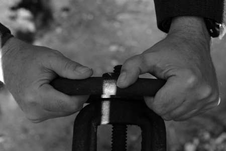 photo hands of the men working at the momentの写真素材