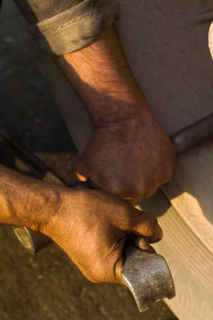 man's hands at work during working hours