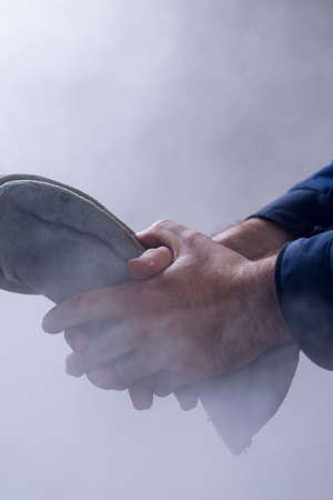 man's hands at work の写真素材