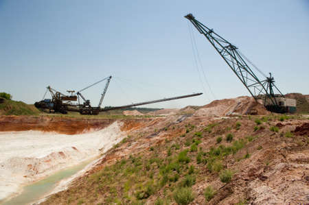 Photo industrial area to dig a quarry for sand mining in natureの写真素材