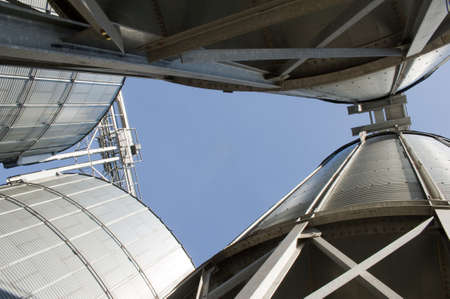 Photo of a big industrial feed mill where grain is processedの写真素材