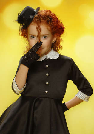 Photo fun baby girl studio shot on a yellow background